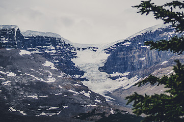 Image showing Avalanche on rough rocky mountains