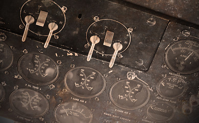 Image showing Different meters and displays in an old plane