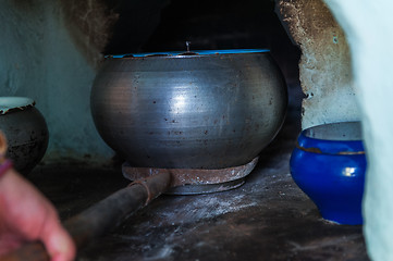 Image showing cooking meals in a Russian stove
