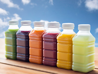 Image showing bottles with different fruit or vegetable juices