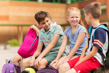 Image showing group of happy elementary school students talking