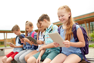 Image showing group of happy elementary school students talking