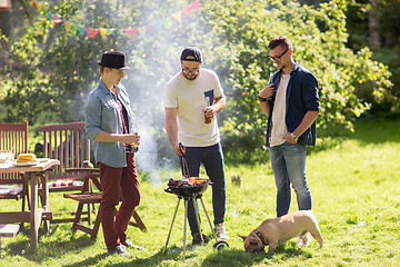 Image showing friends drinking beer at summer barbecue party