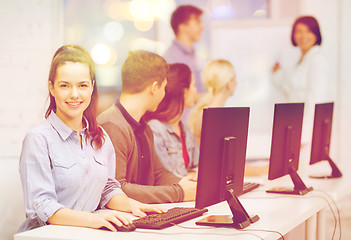 Image showing students with computer monitor at school