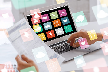 Image showing businessman with laptop computer working at office