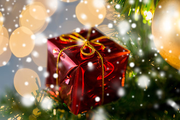 Image showing close up of gift box decoration on christmas tree