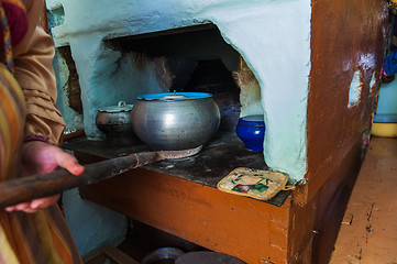 Image showing cooking meals in a Russian stove