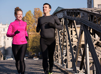 Image showing young  couple jogging