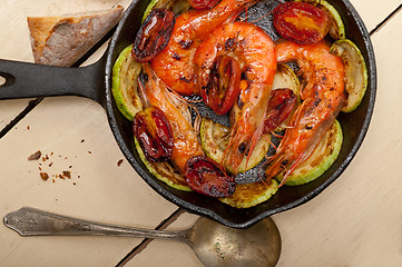 Image showing roasted shrimps with zucchini and tomatoes