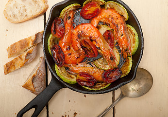 Image showing roasted shrimps with zucchini and tomatoes