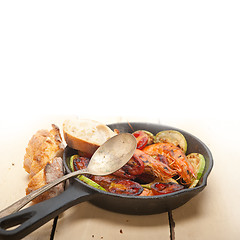 Image showing roasted shrimps with zucchini and tomatoes