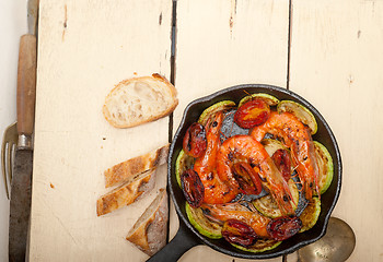 Image showing roasted shrimps with zucchini and tomatoes