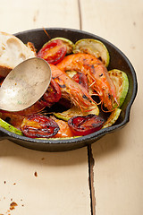 Image showing roasted shrimps with zucchini and tomatoes