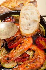 Image showing roasted shrimps with zucchini and tomatoes