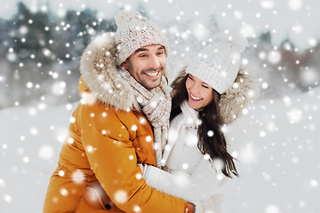 Image showing happy couple hugging and laughing in winter