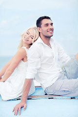 Image showing couple in shades at sea side