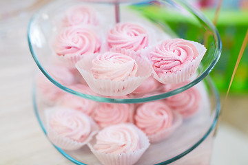 Image showing close up of custard sweets on glass serving tray