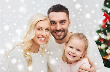 Image showing happy family at home with christmas tree