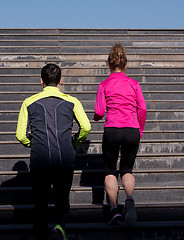 Image showing young  couple jogging on steps