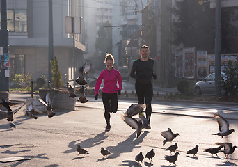 Image showing young  couple jogging