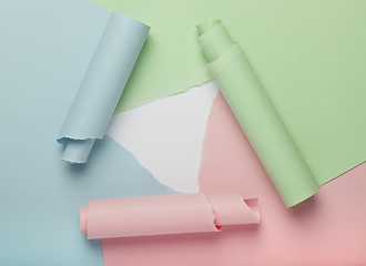 Image showing Abstract torn colored paper background