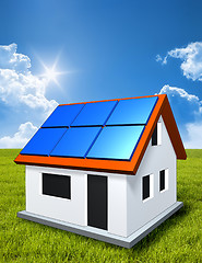 Image showing green house in the sun with solar panels