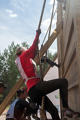 Image showing Teams storm wall in extrim race. Tyumen