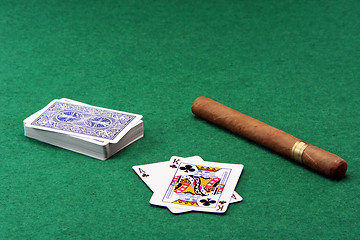 Image showing gabmling and cigar