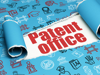 Image showing Law concept: red text Patent Office under the piece of  torn paper