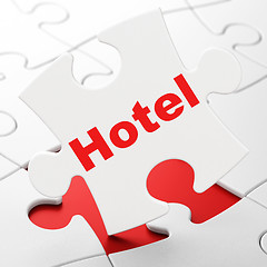 Image showing Vacation concept: Hotel on puzzle background