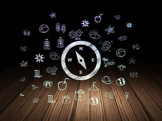 Image showing Travel concept: Compass in grunge dark room