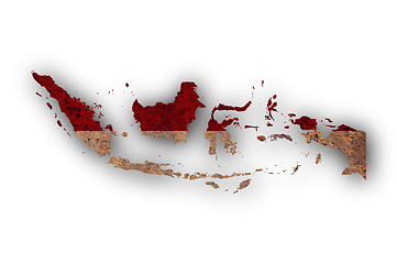 Image showing Map and flag of Indonesia on rusty metal