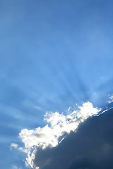 Image showing Sunbeams Entrenching Drafty Clouds