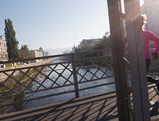 Image showing sporty woman jogging on morning