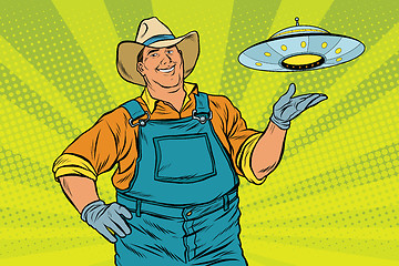 Image showing Rural farmer and UFO