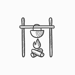 Image showing Cooking in cauldron on campfire sketch icon.