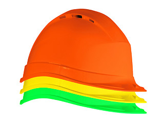 Image showing Yellow, red, and green safety helmets