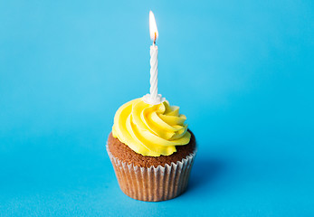 Image showing birthday cupcake with one burning candle