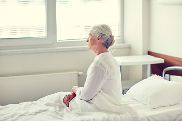 Image showing senior woman patient lying in bed at hospital ward