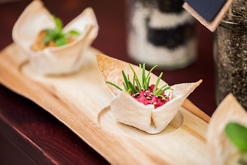 Image showing close up of dough cornet with beetroot filling