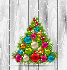 Image showing Christmas Tree and Colorful Balls on Wooden