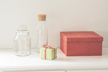 Image showing Gift boxes and glass bottles