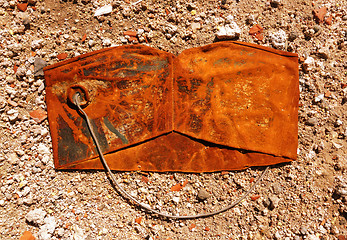 Image showing Old crushed rusty bucket