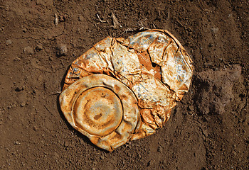 Image showing Old crushed rusty tin can