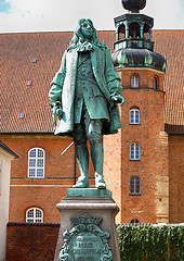 Image showing The statue of Chancellor Peder Griffenfeld and a tower in Copenh