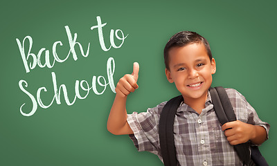Image showing Thumbs Up Hispanic Boy in Front of Back To School Chalk Board