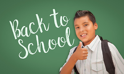 Image showing Thumbs Up Hispanic Boy in Front of Back To School Chalk Board