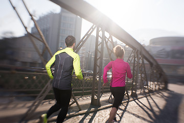 Image showing young  couple jogging