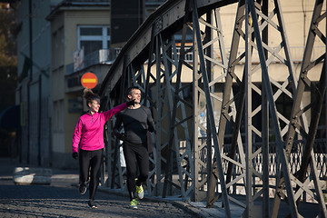 Image showing young  couple jogging