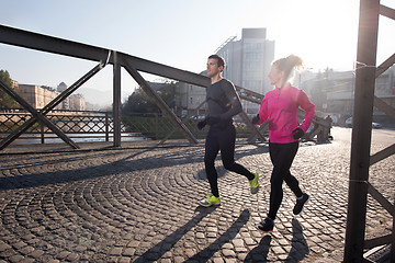 Image showing young  couple jogging